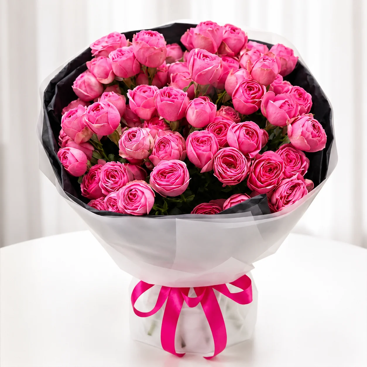 Royal Blush 21 Peony Rose Bouquet featuring 21 fresh pink peony roses in premium floral wrapping